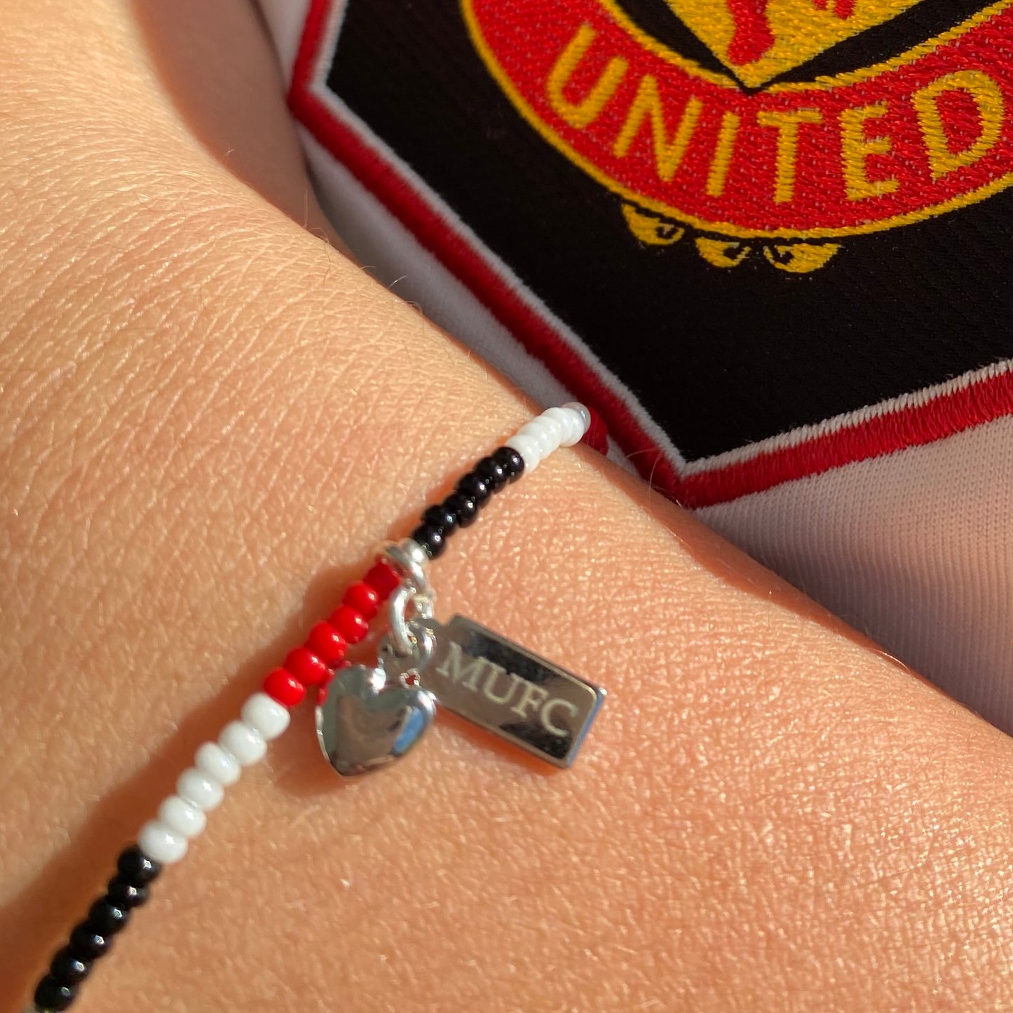 Beadlet Man U charms